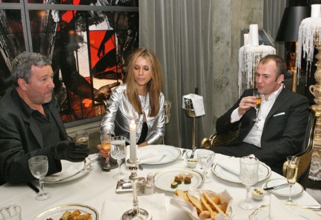 French designer philippe patrick starck (l) is seen at his newly-launched restaurant bon in moscow, pictured at right are andrei melnichenko (r), chairman of the board, mdm bank, and his spouse, mosco...
