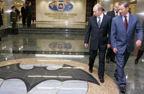 Russian president vladimir putin and russian defence minister sergei ivanov, l-r, visit a new headquarters of the main intelligence agency (gru) of the russian armed forces general staff, moscow, russ...