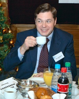 Moscow, russia, november 21, 2006, severstal board chairman alexey mordashov smiles at breakfast with american chamber of commerce in russia representatives, unseen, at the national hotel, moscow.