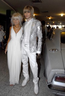 Stylist and singer sergei zverev (r) and his companion at moscow's oktyabr cinema where quentin tarantino's highway thriller death proof received its russian premiere, june 5, 2007.