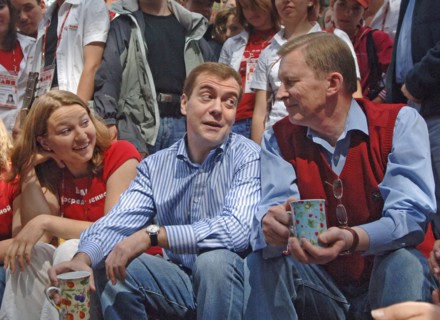 Russia's first deputy pms dmitry medvedev and sergei ivanov, l-r, hold mugs while on a visit to the summer camp of the pro-putin nashi (our people) youth movement at the lake seliger resort, tver regi...