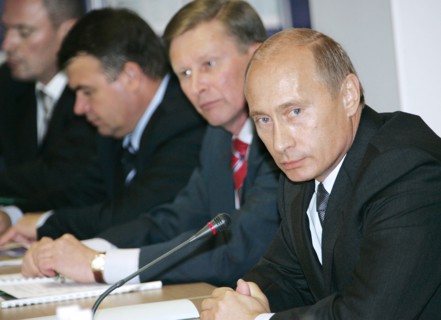 Russian president vladimir putin, first deputy prime minister sergei ivanov, defence minister anatoly serdyukov (r-l) attend a meeting on developing the kamchatka region, vilyuchinsk, kamchatka, russi...