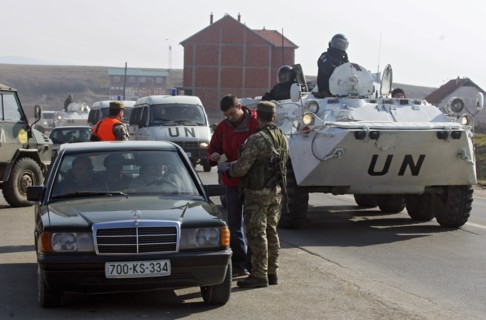 Vehicles at the crossing point in surroundings of pristina, the capital of kosovo, february 25, 2008.