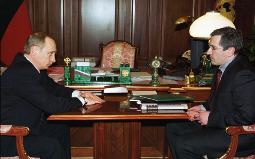 President vladimir putin (l) pictured during the meeting with board chairman of the yukos oil company mikhail khodorkovsky in the kremlin on thursday, during the talks they discussed some problems of ...