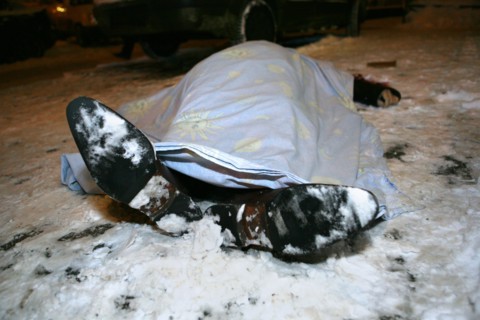 Moscow, russia, february 5, 2009, body of former deputy mayor of grozny gilani shepiyev, gunned down at the entrance to his home in western moscow, seen at the site of the murder.