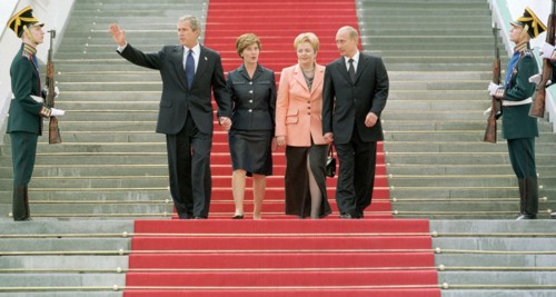 George bush, laura bush, lyudmila putina and vladimir putin (all l-r) pictured leaving the grand kremlin palace after an official launch to have a stroll in the kremlin, on friday, may 24, 2002.