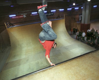 A rollerblader demonstrates his skill , the largest skate park in europe was opened in medvedkovo district of moscow, the park named 'adrenaline' has over 75,000sq ft of specially arranged space for s...