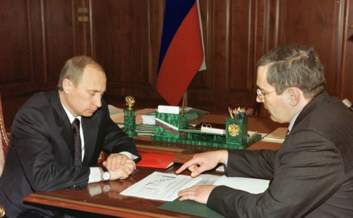 President vladimir putin (l) pictured during the meeting with board chairman of the yukos oil company mikhail khodorkovsky in the kremlin on friday, december 20, 2002.