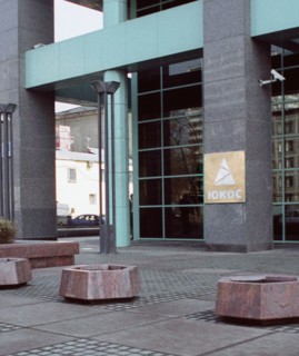 Moscow, russia, april 22, 2003,picture shows the entrance to the 'yukos' office in moscow , the yukos and sibneft oil companies declared on tuesday that they were merging to form a new company *yukoss...