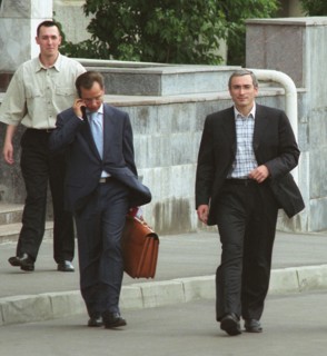Moscow, russia, july 4, 2003, mikhail khodorkovsky (r), the head of the yukos oil company and russia's wealthiest man, pictured upon leaving the general prosecutor's office
