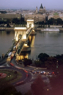 The chain bridge across the dunabe in budapest, hungary looking towards gresham palace, it was constructed in the middle of the 19th century and was the first permanent connection between buda and pes...