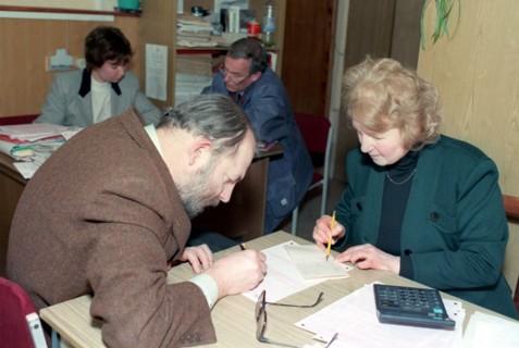 Russian tax payer with a federal tax inspector, moscow, russia, march 2002.