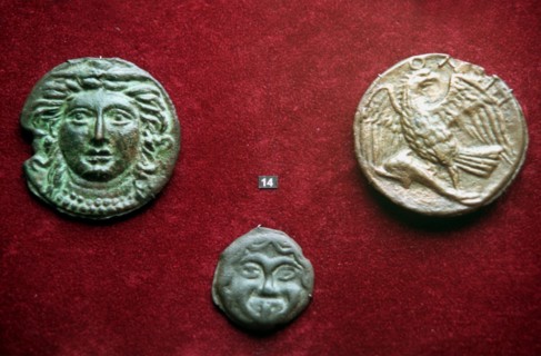 Moscow, russia, 02,99, bronze coins of the 4th century b,c, found in the northern regions of the black sea shore are displayed at the exhibition of the greek and roman coins of the vi-iv c, b,c, opene...