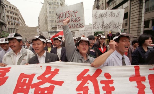 Belgrade,yugoslavia, may 9 2001, in response to the bombing of the chinese embassy in belgrade, about 200 young chinese rally in downtown belgrade on sunday demanding to end the nato`s bombing of yugo...