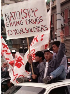 Belgrade,yugoslavia, may 9 2001, in response to the bombing of the chinese embassy in belgrade, about 200 young chinese rally in downtown belgrade on sunday demanding to end the nato`s bombing of yugo...