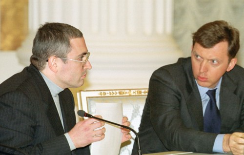 Moscow, russia, january 24 2001: mikhail khodorkovsky, chairman of yukos oil company directorate (left) and oleg deripaska, general director of 'russian aluminium' company, exchanging looks during the...