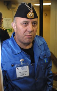 Kursk submarine tragedy, barents sea, russia, august 26 2001, chief of the group of russian divers, rear-admiral gennady verich on board of the mayo recovery ship, preapring to lift the sunken nuclear...