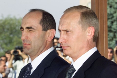 Yerevan, armenia, september 14, 2001, russian president vladimir putin (r) and his armenian counterpart robert kocharyan pictured during an official welcoming ceremony upon the arrival of russian head...