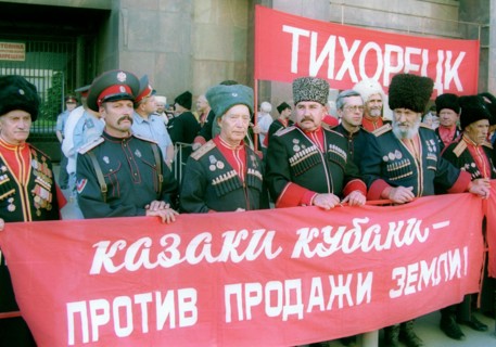 Moscow, russia, june 21 2002: some cossacks from the kuban area took part in the meeting the banner reads 'cossacks are against sale of land!', communists staged a meeting in front of the state duma t...