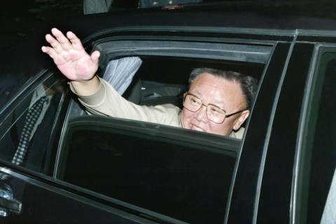 North korean leader kim jong-il waves his hand prior to the departure from vladivostok, russia, on friday, 8/23/02  .