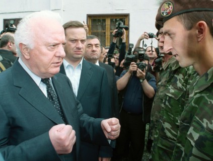 Georgia 8/27/02: georgian president eduard shevardnadze (l) visited the pankiyskoye gorge august 27, where he met with local residents and servicemen of the georian ministry of internal affairs.