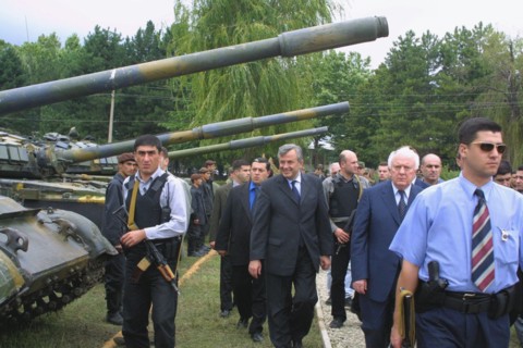 Georgia, 8/02: georgian president eduard shevardnadze meeting with local residents and georgian interior servicemen during his visit to the pankiyskoye gorge august 27.