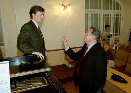 Famous russian opera singer vladimir atlantov (right) teaching danlll sokolov, third year student at the st, petersburg conservatory, st,petersburg, russia, september 12 2002.