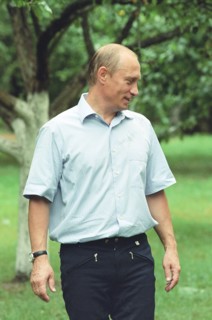 Russian president vladimir putin strolling in presidetnial residence novo-ogaryovo in july 2002.