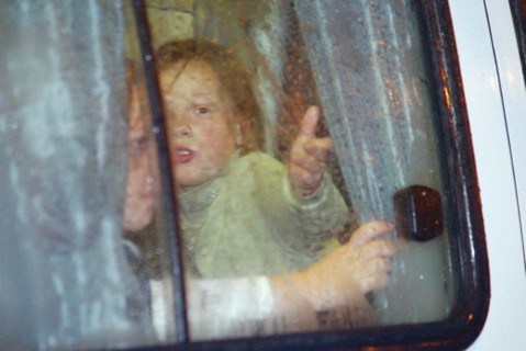 Moscow, russia, 10/23/02: some children (seen in a bus) were allowed to leave the building of the palace of culture of the ball-bearing plant which had been seized by terrorists, on wednesday, accordi...