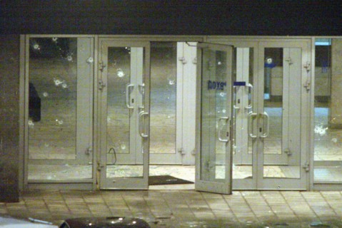Moscow, russia, october 24 2002: picture shows the main entrance to the palace of culture riddled with bullet holes when terrorists seized the building on wednesday evening, people, who had come to se...