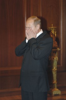 Moscow, russia,10/26/02: chechen hostage crisis: president vladimir putin (c) talks to doctors, president visited released hostages in need of medical attention who were taken to the sklifosovsky firs...