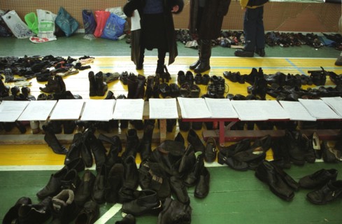 Moscow, russia, november 12 2002: former hostages retrieving their personal belongings at the sports hall of the dubrovka theatre centre on tuesday, the moscow prosecutor's office has started to retur...