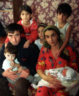 Belarus, november 12, 2002: salam machigov, his wife khedy and their children are renting an apartment in brest