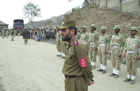 Afghanistan, march 17 2003, lieutenant-colonel dagarman khazratgul (in pic) and his subordinates keep the order at tourkham border crossing point, thousands of people cross daily the border between af...