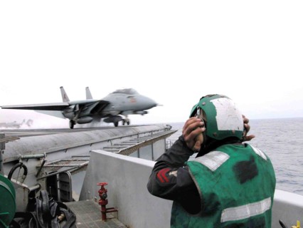 Mediterranean sea, uss theodore roosevelt, march 24, 2003, an fa18 hornet fighter takes off for another mission from the theodore roosevelt aircraft carrier.