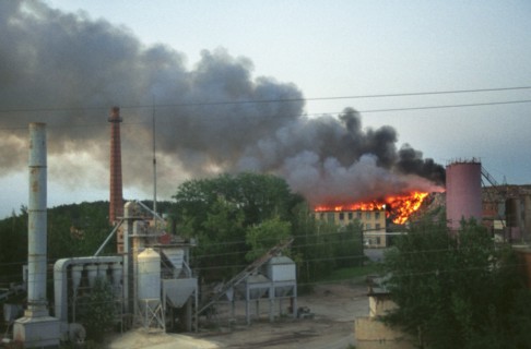 Moscow region, russia, smoke of a burning dump at the asphalt plant in domodedovo, yesterday cloaked the whole town, the ecological situation in moscow suburbs keeps deteriorating, 08,2003.