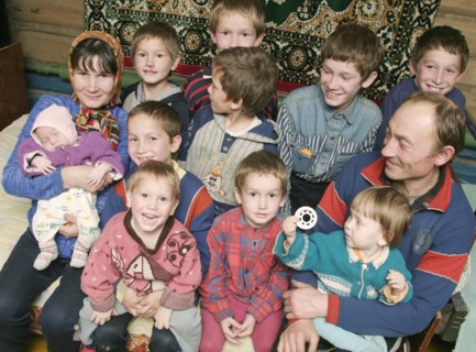 Chuvashia, siberia, russia, october 25 2003, chuvash family living in poverty, mother valentina pours soup for father leonid and their children, there are ten boys in the family, the elder is 13 years...