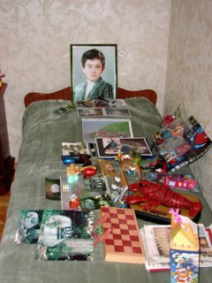 The portrait, bed and toys of a 10-year-old kostya - the son of a construction engineer vitaly kaloyev, who is suspected of the murder of a swiss air traffic controller peter nielsen, north ossetia, r...