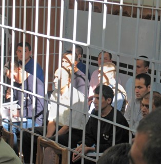 Tashkent, uzbekistan, rebels involved in mass disturbances in andizhan in may, 2005 appear in the supreme court of uzbekistan, the court found them guilty of terrorism, an attempted coup d'etat and un...
