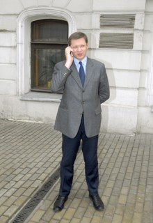 State duma deputy vladimir ryzhkov talks on his mobile phone before the other russia organization’s forum in the central house of journalists, moscow, april 19, 2007, moscow, russia.