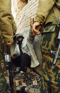 Second chechen war, a chechen rebel captured by russian federation troops in grozny, chechnya, january 2000.
