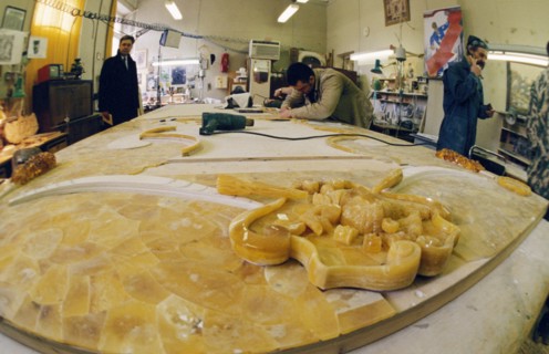 Artisans working on the restoration of panels from the amber room in catherine palace, st, petersburg, russia, april 2000.