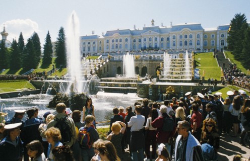 People gathered at the traditional event of turning on the fountains in may at petrodvorets (peterhoff) in st, petersburg, russia.