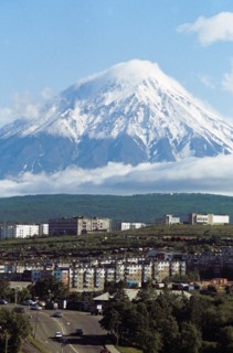 The city of petropavlovsk with koryak volcano (3,464 meters) in the background, kamchatka, siberia, russia.