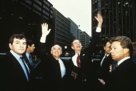 Mikhail gorbachev and george bush waving to crowds during the soviet premier's visit to the united staes in 1987.