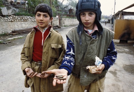 Children bring up ammunition to soldiers during the nagorno kharabakh conflict, may 1992.