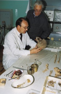 Forensic experts n, nevolin and a, avdonin examine the remains of the romanov family in yekaterinburg, russia, 1992.