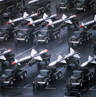 Trucks bearing sa-1 and sa-2 surface -to-air missiles lining up for a military parade in red square celebrating the 65th anniversary of the great october socialist revolution, november 7, 1982, moscow...