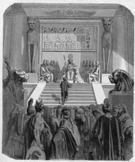 Joseph stands in front of the Pharaon