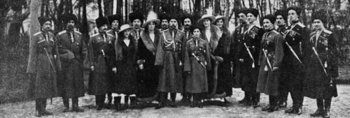 The Emperor Nicolas II, his son and his daughters Grand Duchesses, amid officers of the Imperial Guard. 1916